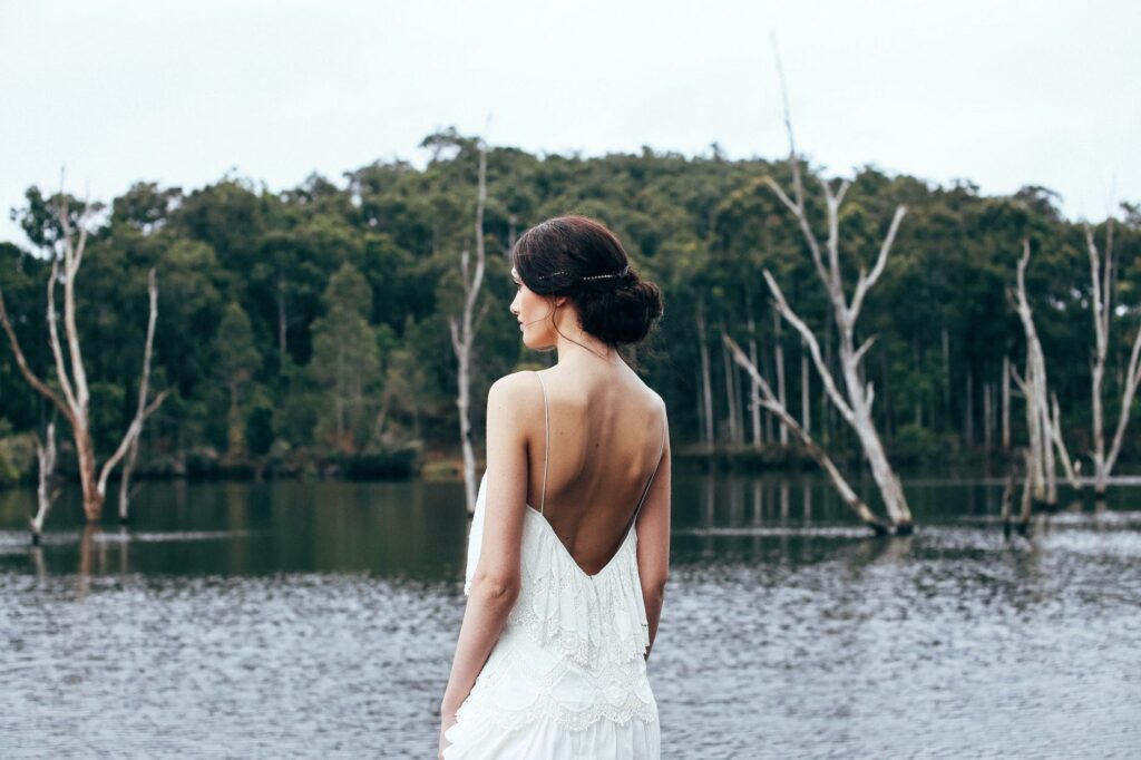 anonymous elegant bride standing near lake منتوف MANTOUF